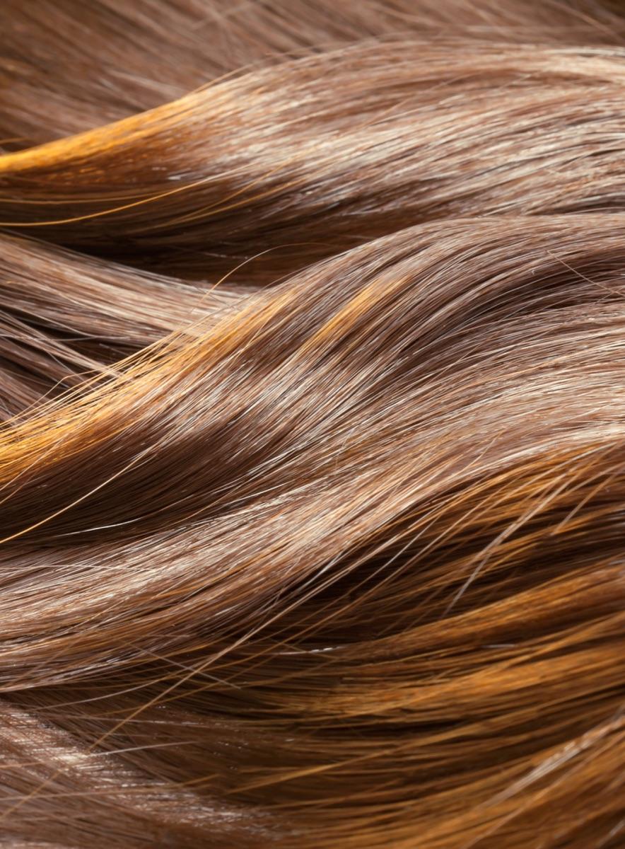 Hand-sculpted blowout designed to hold through Naples Florida humidity for days