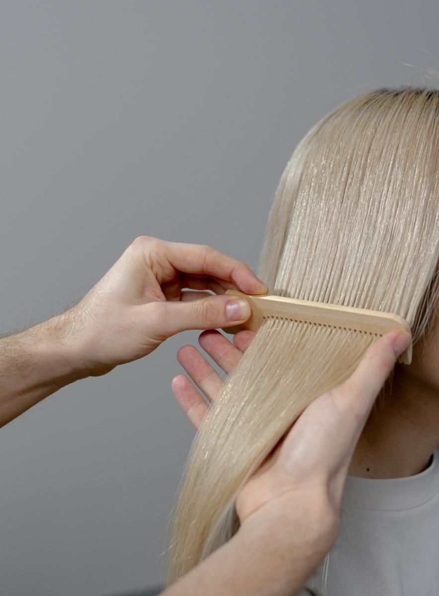 Luxury bond-repair conditioning treatment layered into a Robert of Philadelphia salon visit